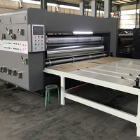 Machine à découpe rotative et à fente pour l'impression flexographique pour la fabrication de boîtes en carton