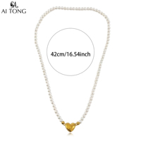 Collier tendance en acier inoxydable plaqué or 18 carats avec perles d'imitation et fermoir magnétique, bijou de mode pour femme et fille, idéal comme cadeau