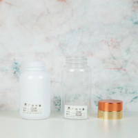 Capsule en plastique PET 150ml/160ml personnalisée emballage de médicaments flacon de pilules rond avec couvercle à vis en or rose sérigraphie surface