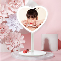 Miroir de maquillage de haute qualité avec logo personnalisé Smart Touch HD en forme de coeur miroir de maquillage éclairé avec base pour le voyage