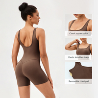 D42158 Yoga Onessuit avec coussin de poitrine pour les femmes corps nu serré hanche levage combinaisons course sport Yoga costume