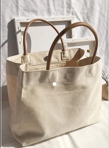Sac fourre-tout en toile de coton réutilisable et écologique avec poignées en cuir, sac à bandoulière minimaliste uni pour le shopping, les voyages et le bureau - Product Image 4
