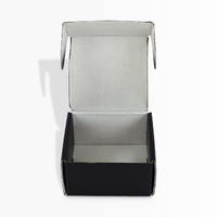 Carpeta Portátil Reutilizable de Cartón Corrugado Negro Mate Personalizada con Laminado Mate y Forma de Avión