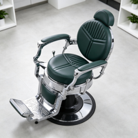 Fauteuil de barbier robuste vert, dossier rond avec surpiqûres géométriques, accoudoirs cantilever chromés et base noire.