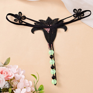 Tanga Sexy de Encaje Negro Ding Zhi Mei con Cuentas que Brillan en la Oscuridad, Accesorio Íntimo para Mujer - Product Image 1