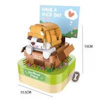 EPT Vente en gros Construction DIY Jouet électronique Rotatif Mini Briques Blocs de construction Jouet Chien Boîte à musique