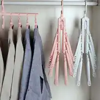 Moda di plastica antiscivolo vestiti grucce vestito piegante del gancio multiuso panno hanger stand