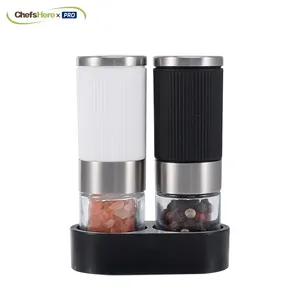 Wholesale Top Sale 25mlx2 Mini Salt and Pepper Spice Bottle Mini Spice Grinder with Grinder Top with Plastic Base