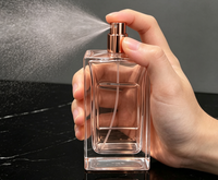 Botella de Perfume Cuadrada de Vidrio al por Mayor de 100 ml, Cuerpo de Vidrio Transparente, Bomba Pulverizadora de Aluminio Dorado Rosa
