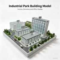 Maquette de parc industriel avec bâtiments d'usine, dortoirs, immeubles de bureaux, routes et ceinture verte