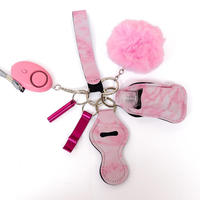 Lot de 7 porte-clés de sécurité 7-en-1 en strass rose, boîte à pilules, accessoires et fournitures d'autodéfense en strass