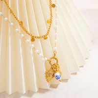 KAVNAR - Collar de Perlas Chapado en Oro de 18K al por Mayor, Cadena de Acero Inoxidable en Capas con Colgante de Corazón, Joyería para Mujer, OEM Personalizado