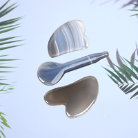 Outil de massage corporel avec étiquette vierge de rouleau de jade d'agate grise de qualité supérieure avec outil de sculpture de visage anti-rides de peigne Gua Sha