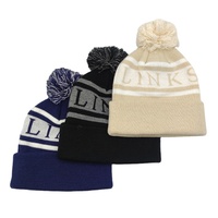 Groothandel op maat gemaakte pomponmuts, acryl jacquard gebreide wintermuts, warme thermische gebreide muts met boord