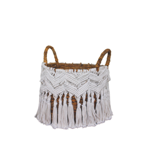 The Gabrielle Rattan <b>Basket</b> combines banana fiber and macrame, creating an elegant natural craft for any <b>corner</b> of your home. - Product Image 1