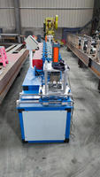 Machine de formage de rouleaux de portes de volets roulants d'occasion avec poinçonnage de trous ronds Système de pompe à dévidoir en acier pour les industries agricoles de carreaux de bâtiment