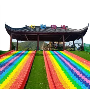 Plastic Dry Snow Slide Playground Park Colorful Slip Slide Rainbow Dry Slide With Donut Glider Tire