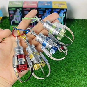เครื่องเกมคีบตุ๊กตาขนาดเล็กแบบพกพา รุ่นใหม่มาแรง พร้อมพวงกุญแจโลหะ ของรางวัลสำหรับเด็ก - Product Image 4