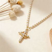 Collier de perles croisées personnalisé, tendance et de luxe léger, style rétro simple, best-seller transfrontalier Europe-Amérique