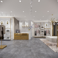 Porte-vêtements en métal MDF doré tendance pour femmes pour la décoration de magasin