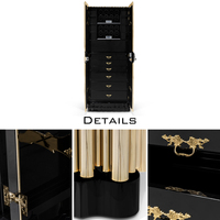 Coffre-fort de luxe haut de gamme de haute qualité avec tubes en laiton plaqué or et remontoirs de montres en bois laqué noir