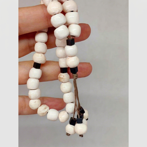 Rosario de cuentas redondas de hueso pulido con espaciadores negros y borla H S HUSAIN CRAFTS de Uttar Pradesh - Product Image 1