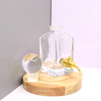 Bouteille de parfum en verre de 250ml bouteille d'affichage de décanteur bouteille en verre d'huile d'oud avec robinet