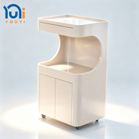 Chariot de rangement mobile incurvé brillant pour salon de beauté avec tiroir et armoire pour spa des ongles, salon de coiffure et de beauté