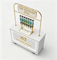 Comptoir de présentation mobile personnalisé pour parfums avec distributeur et support de bouteilles, kiosque de remplissage de parfums en gros pour centres commerciaux avec roues