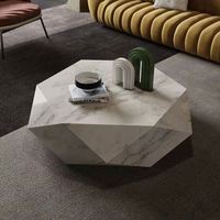 Table basse italienne minimaliste haut de gamme en forme de roche, taille salon moderne et simple en forme de lumière