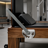 Reformer Pilates en bois de noyer avec demi-tournebroche, certifié CE, machine commerciale pour studio de Pilates de luxe