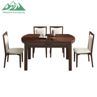 Ensemble de table à manger ronde extensible Wayon de style moderne du milieu du siècle, bois de noyer en forme d'étoile, chaises crème