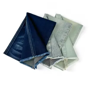 مخزون قماش الجينز TC ثنائي النواة قماش الدنيم لينة خفيفة الرماد قماش الجينز مع حافة لمصنعي الجينز بالجملة