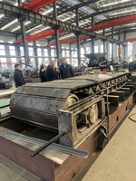Plaque d'alimentation pour machines de manutention de matériaux en vrac
