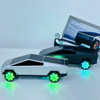 Altavoz Portátil Inalámbrico de 15W con Diseño de Tesla Cyberpickup, Mini Altavoz Karaoke para Coche con Cargador Inalámbrico de 15W