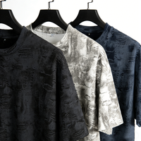 T-shirt en coton tricoté épais 260 g/m² pour hommes, vierge, délavé à l'acide, effet vieilli, style streetwear, col rond, coupe classique, avec lettrage, vente en gros