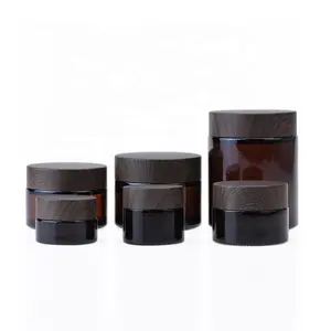 wholesale good quality fancy round 5g 10g 15g 30g 50g 100g brown glass cosmetic cream jar with wood grain lid