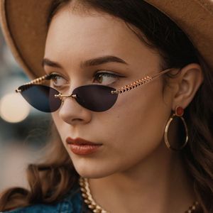 Lunettes de soleil œil de chat sans monture pour femmes, monture en métal, protection UV400, style urbain, design haut de gamme - Product Image 3