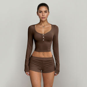 Ensemble chic et sportif occidental pour femme : haut court à manches longues boutonné et short taille haute élastique, deux pièces ajustées de couleur unie - Product Image 5
