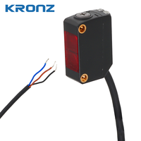 Sensor Fotoelektrik Kompak KRONZ dengan Supresi Latar Belakang (BGS), Jarak Deteksi 40-200mm, Indikator LED, Kompatibel dengan Balluff, IP67