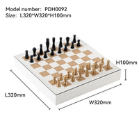 Décoration d'intérieur artistique et jeu stratégique, jeu d'échecs en métal de luxe avec échiquier en cuir