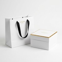 Sac cadeau en papier argenté métallisé personnalisé avec poignée en ruban, emballage de luxe pour boutique de marque