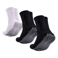 Vente en gros Chaussettes de sport de football unisexes noires écologiques en bambou à haute compression et antidérapantes avec logo antidérapant pour hommes