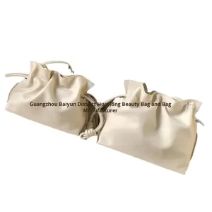 Alta versión de lujo de cuero de vaca cubo nube bolso de mujer nuevo Lucky <span class=keywords><strong>Flamenco</strong></span> cordón rompecabezas cuero genuino impermeable - Product Image 5