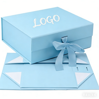 Trouvez une boîte à rabat magnétique pliable similaire à l'Icon Foldable, avec fermeture à ruban, haut de gamme, pour cadeau d'anniversaire, entièrement faite à la main, en papier artistique.