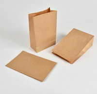 Vente en gros de sacs alimentaires jetables en papier kraft brun de 1LB à fond plat sans poignée Logo et taille personnalisés pour emballage de fast-food à pain