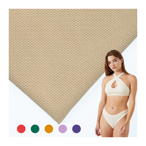 Tissu tricoté respirant style nid d'abeille en nylon et élasthanne pour maillots de bain - Product Image 1