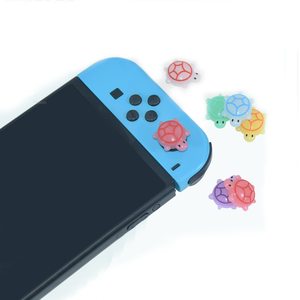 Couvercle de bouton de capuchon de joystick en silicone pour contrôleur de jeu de console Nintendo Switch /Lite/OLED capuchon de joystick Little Turtle lumineux - Product Image 1
