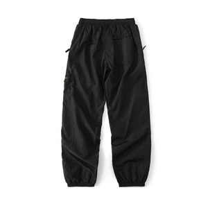 Pantalon décontracté ample pour homme, style hip-hop, avec patch brodé de marque de créateur, motif boussole, en nylon, avec détails métalliques et pierres, imperméable et réfléchissant, style islandais - Product Image 4