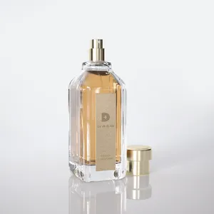 Nuovo Design 100ml elegante e unica bottiglia di vetro verde Logo personalizzato di colore cosmetico denso bottiglie di profumo con scatola